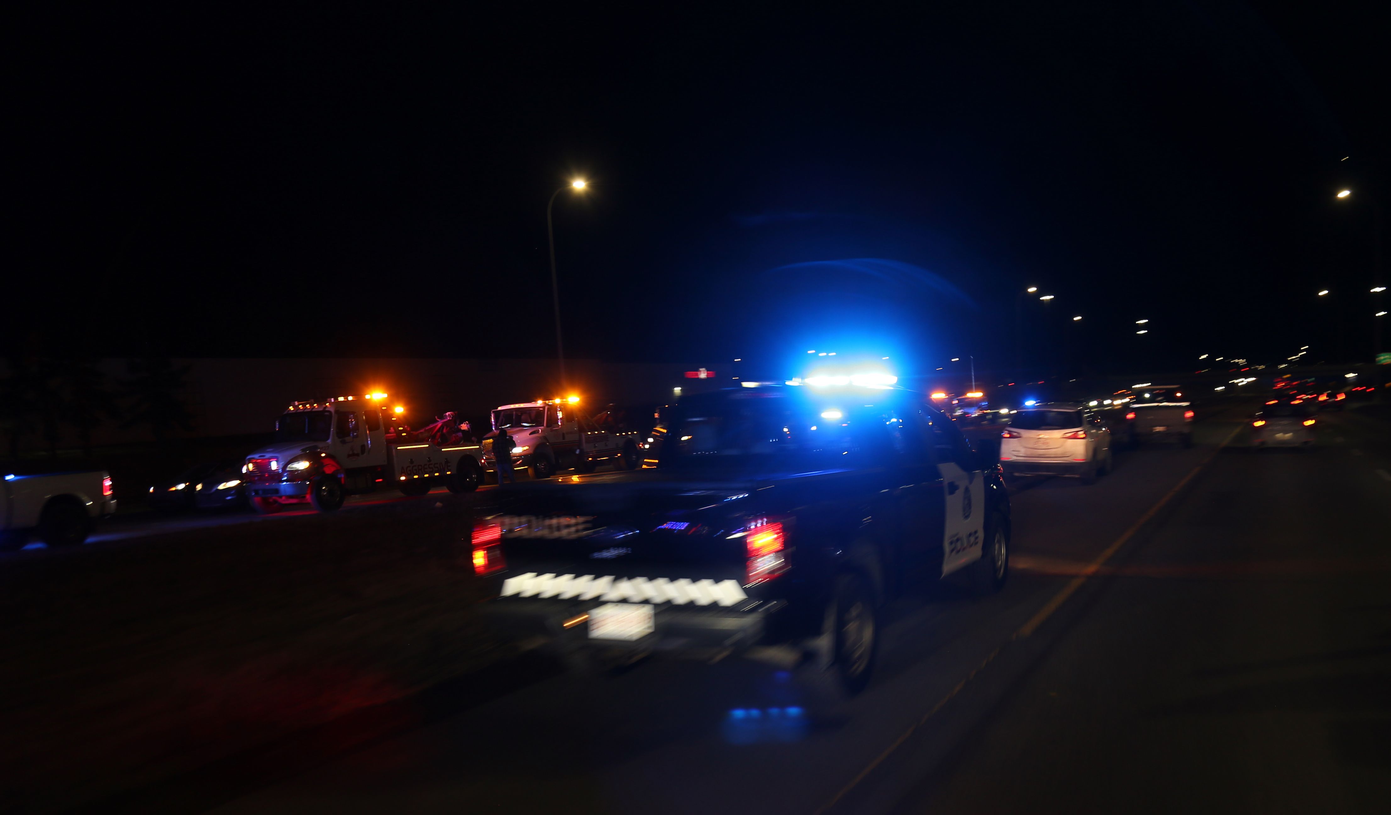 Members of the Calgary Fire Department and other roadside responders take part in the Slow Down Move Over awareness event along 16 Avenue N.E. in Calgary on March 5, 2026. Photo / Anna Ferensowicz / Discover Airdrie